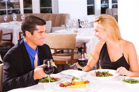 simsearch:625-00902698,k - Mid adult man and a young woman sitting in a restaurant Foto de stock - Sin royalties Premium, Código: 625-00838950