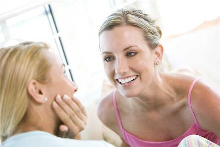 simsearch:625-00839074,k - Close-up of two young women talking Stock Photo - Premium Royalty-Free, Code: 625-00839092