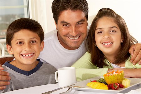 Portrait of a father and his two children Stock Photo - Premium Royalty-Free, Code: 625-00839235