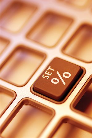 simsearch:625-00840035,k - Close-up of a percentage button on a calculator Stock Photo - Premium Royalty-Free, Code: 625-00839997