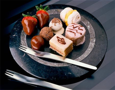 simsearch:625-01250196,k - High angle view of chocolates and pastries on a plate Stock Photo - Premium Royalty-Free, Code: 625-00849290