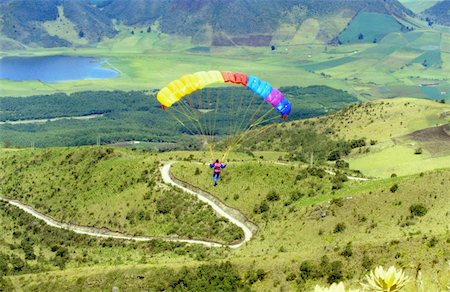 simsearch:625-00801301,k - Aerial view of a person paragliding Stock Photo - Premium Royalty-Free, Code: 625-00849443