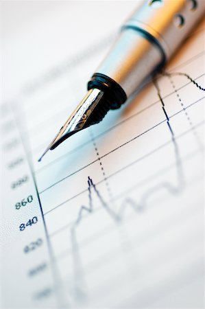 simsearch:625-00840035,k - Close-up of a fountain pen on a line graph Stock Photo - Premium Royalty-Free, Code: 625-00840020
