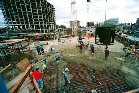 pourer - Workers on construction site pouring cement in new office building in Bethesda, Maryland Stock Photo - Premium Royalty-Free, Code: 625-00840417