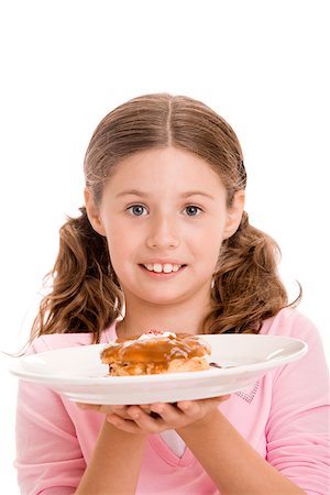 simsearch:625-01250196,k - Portrait of a girl holding a donut in a plate Stock Photo - Premium Royalty-Free, Code: 625-00841190