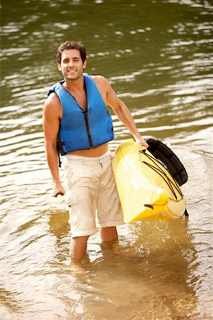 simsearch:625-00801301,k - High angle view of a mid adult man holding a kayak and an oar Stock Photo - Premium Royalty-Free, Code: 625-00843736
