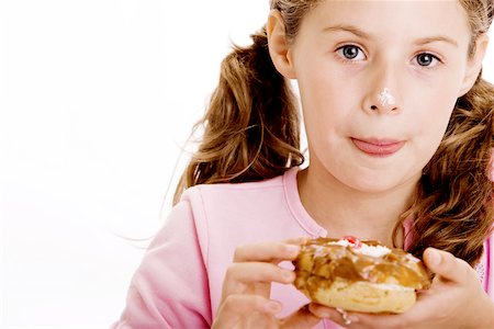 simsearch:625-01250196,k - Portrait of a girl eating dessert Stock Photo - Premium Royalty-Free, Code: 625-00850206