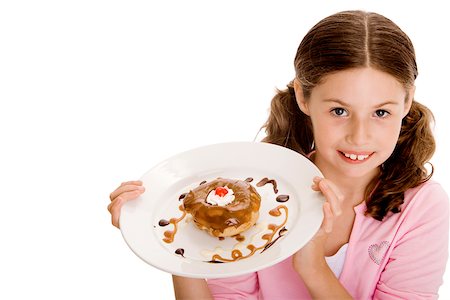 simsearch:625-01250196,k - High angle view of a girl holding dessert in a plate Stock Photo - Premium Royalty-Free, Code: 625-00851160