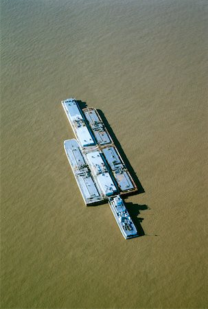 Aerial view of grain barges on the river, Mississippi River, New Orleans, Louisiana, USA Stock Photo - Premium Royalty-Free, Code: 625-00899097