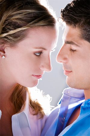 simsearch:625-00850507,k - Close-up of a young woman and a mid adult man face to face Stock Photo - Premium Royalty-Free, Code: 625-00901689