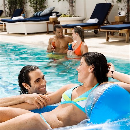 simsearch:695-03374346,k - Two couples in a swimming pool Stock Photo - Premium Royalty-Free, Code: 625-00902679