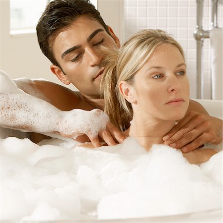 Close-up of a young couple in a bubble bath Stock Photo - Premium Royalty-Free, Code: 625-00902795