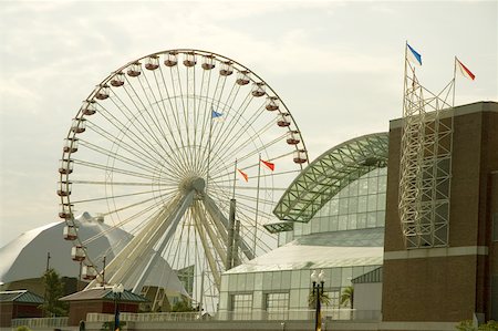 simsearch:625-00805928,k - Ferris wheel in an amusement park Navy Pier Park, Chicago, Illinois USA Stock Photo - Premium Royalty-Free, Code: 625-00903370