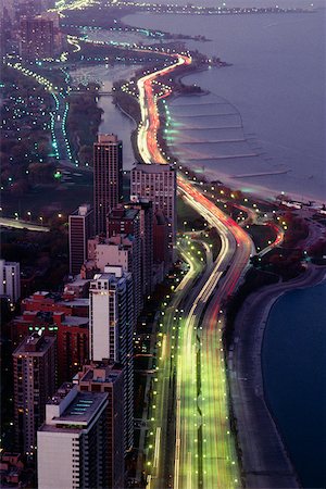 Aerial view of buildings along a highway in a city, Lake Michigan, Chicago, USA Stock Photo - Premium Royalty-Free, Code: 625-00903855