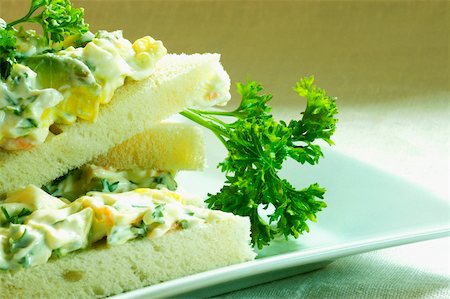 simsearch:625-01261270,k - Close-up of a sandwich with cheese on a tray Stock Photo - Premium Royalty-Free, Code: 625-01038591