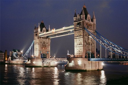Low angle view of Tower bridge at night, London, England Stock Photo - Premium Royalty-Free, Code: 625-01040545