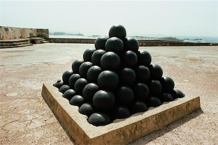 explosives - Bombshells arranged in a pyramidal shape, San Juan, Puerto Rico Stock Photo - Premium Royalty-Free, Code: 625-01040950