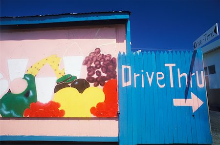 drive-thru - Arrow sign on a picket fence, Texas, USA Stock Photo - Premium Royalty-Free, Code: 625-01094855