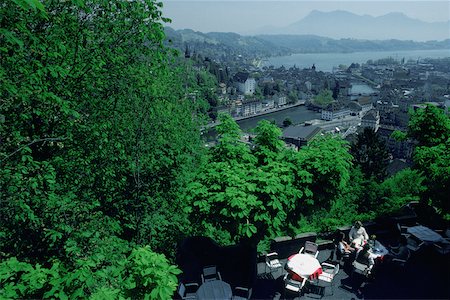 High angle view of a group of people sitting at a hotel, Chateau Gutsch, Lucerne, Switzerland Stock Photo - Premium Royalty-Free, Code: 625-01095286