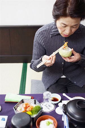 farming generation photography - High angle view of a senior woman eating Stock Photo - Premium Royalty-Free, Code: 625-01096495