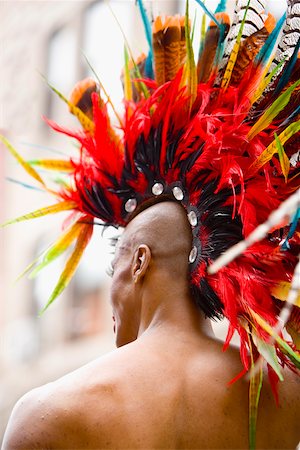 Rear view of a gay man wearing a colorful headdress Stock Photo - Premium Royalty-Free, Code: 625-01097134
