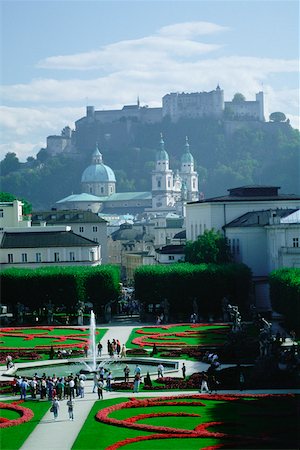 High angle view of tourist in a garden, Rose Garden, Kollegienkirche, Salzburg, Austria Stock Photo - Premium Royalty-Free, Code: 625-01098586