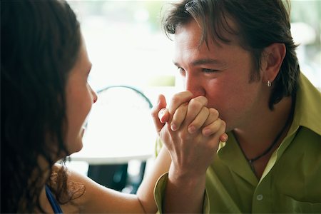 simsearch:625-01092421,k - Close-up of a mid adult man kissing a young woman's hand Stock Photo - Premium Royalty-Free, Code: 625-01092672