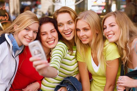 simsearch:625-00839074,k - Five young women taking a photograph of themselves Stock Photo - Premium Royalty-Free, Code: 625-01092810