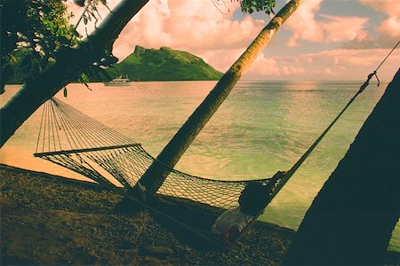 Close-up of a hammock on the beach, French Polynesia Stock Photo - Premium Royalty-Free, Code: 625-01249628