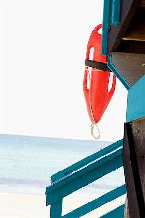 Lifeguard float hanging on a lifeguard hut Stock Photo - Premium Royalty-Free, Code: 625-01250852