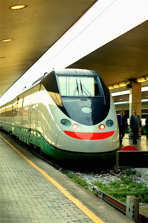 Train at a railroad station platform, Rome, Italy Stock Photo - Premium Royalty-Free, Code: 625-01251302