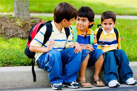 flip flops for kids - Three schoolboys sitting together Stock Photo - Premium Royalty-Free, Code: 625-01251440