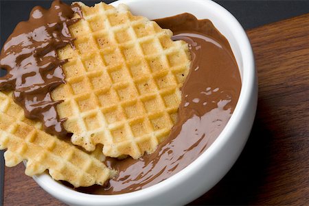simsearch:625-01250196,k - Close-up of a piece of waffle in chocolate Stock Photo - Premium Royalty-Free, Code: 625-01251789