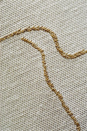 embroidery designs - Close-up of embroidery on fabric Stock Photo - Premium Royalty-Free, Code: 625-01251885