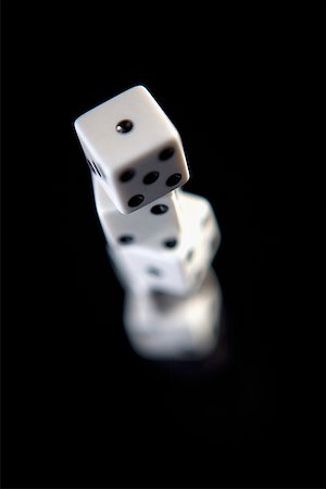 dice - Close-up of four dice one on top of the other Stock Photo - Premium Royalty-Free, Code: 625-01251996