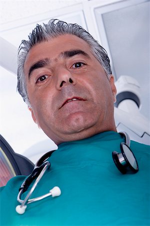 simsearch:625-01249642,k - Portrait of a male surgeon with a stethoscope around his neck Foto de stock - Sin royalties Premium, Código: 625-01252239