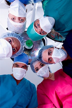 simsearch:625-01249642,k - Low angle view of surgeons in an operating room Foto de stock - Sin royalties Premium, Código: 625-01252468
