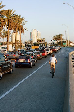 people in traffic jam - Cyclist on the road, Miami, Florida, USA Stock Photo - Premium Royalty-Free, Code: 625-01264094