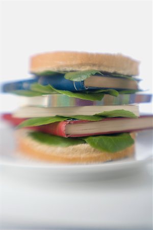 simsearch:625-01261270,k - Close-up of note pads between a sandwich on a plate Stock Photo - Premium Royalty-Free, Code: 625-01264769