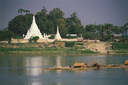 Pagoda along a river, Ayeyarwady river, Myanmar Stock Photo - Premium Royalty-Free, Code: 625-01261478