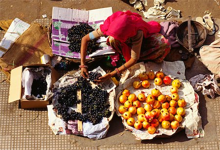 simsearch:630-03479347,k - High angle view of a woman selling fruits, Jaipur, Rajasthan India Stock Photo - Premium Royalty-Free, Code: 625-01261705