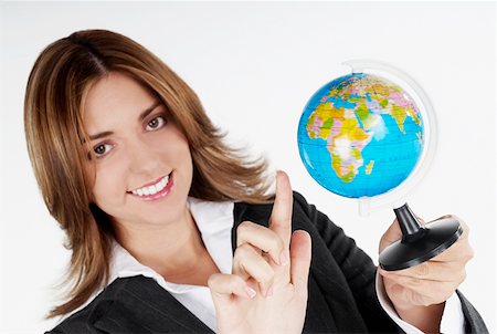 simsearch:625-01097830,k - Portrait of a businesswoman holding a globe and smiling Stock Photo - Premium Royalty-Free, Code: 625-01262434