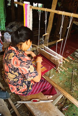simsearch:841-02946091,k - High angle view of a young woman weaving on traditional loom, Sukhothai, Thailand Stock Photo - Premium Royalty-Free, Code: 625-01262720