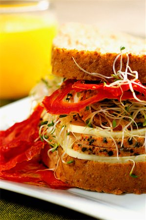 simsearch:625-01261270,k - Close-up of a sandwich with a glass of juice Stock Photo - Premium Royalty-Free, Code: 625-01263337
