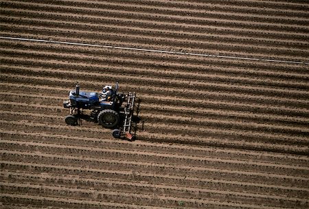 plow field - Aerial, plowing farm field Stock Photo - Premium Royalty-Free, Code: 625-01745981