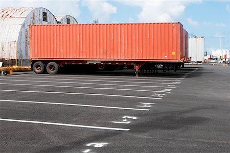 Cargo container on the lane at a commercial dock Stock Photo - Premium Royalty-Free, Code: 625-01746178