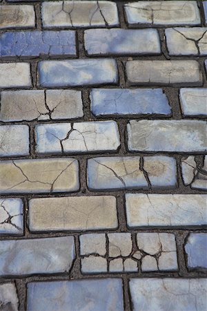 Close-up of a cobblestone road, Old San Juan, San Juan, Puerto Rico Stock Photo - Premium Royalty-Free, Code: 625-01746373