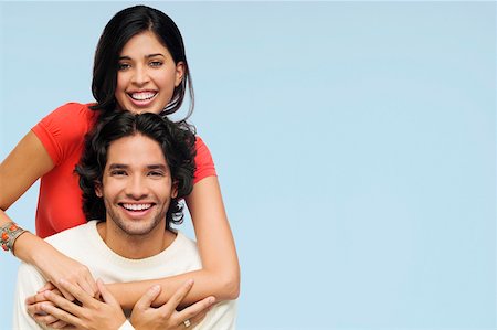 simsearch:625-00850507,k - Portrait of a young couple smiling Stock Photo - Premium Royalty-Free, Code: 625-01746685