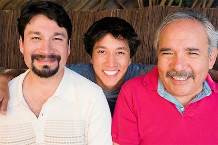 simsearch:400-06142278,k - Portrait of a young man smiling with his father and grandfather Stock Photo - Premium Royalty-Free, Code: 625-01746986