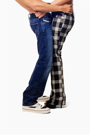 simsearch:625-00850507,k - Mid section view of a young couple standing together Stock Photo - Premium Royalty-Free, Code: 625-01747128